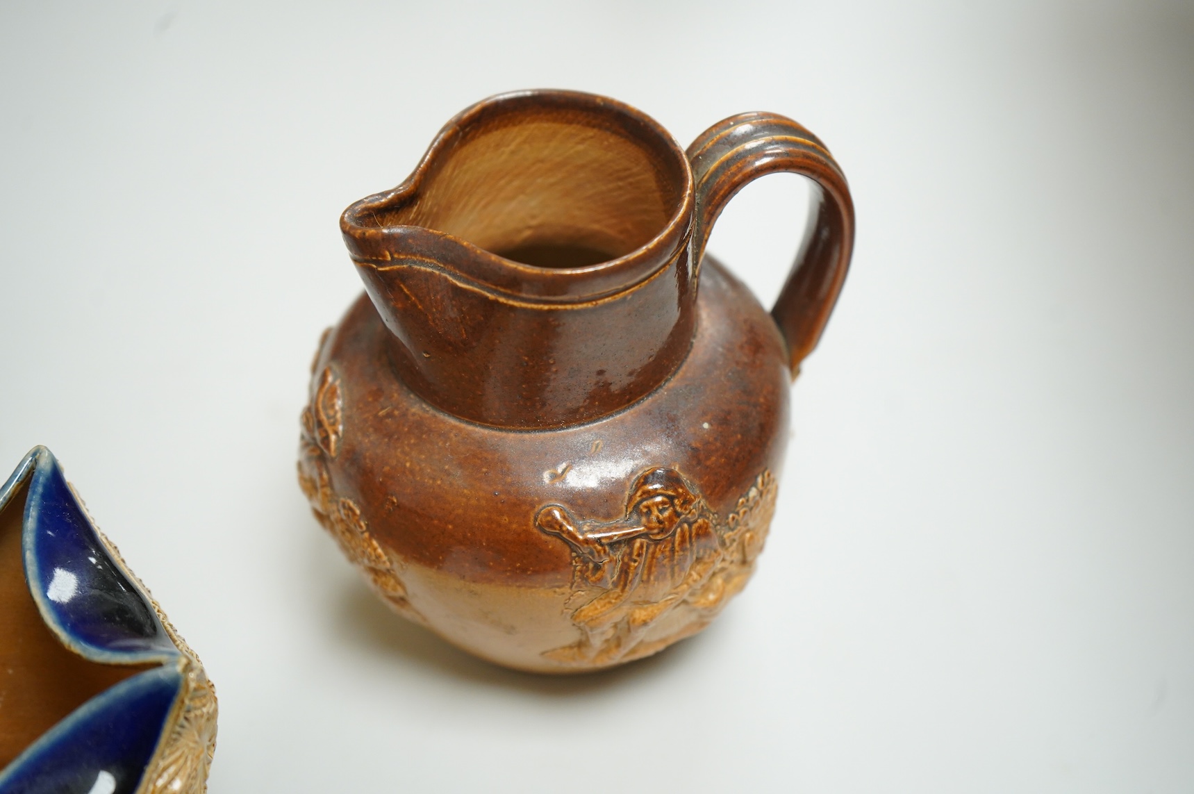 A pair of Royal Doulton Slater’s patent vases, 26cm high and pots and a jug together with a collection of miniature stoneware pots jugs and a pair of peppers